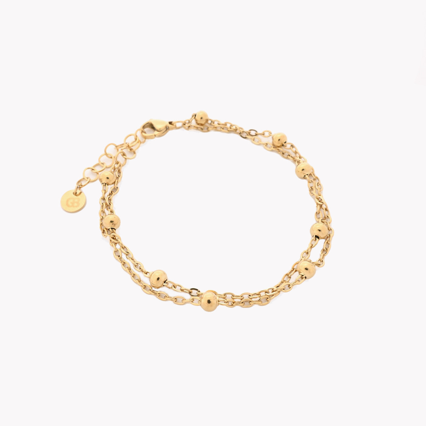 Bracelet maille double boules dorées