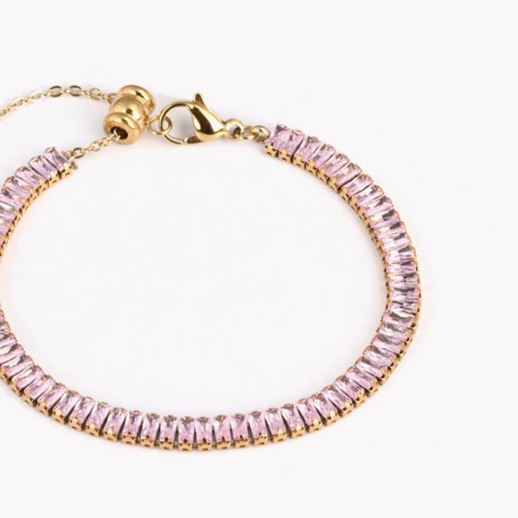 Pulsera de acero riviera cristales baguette rosa acabado oro