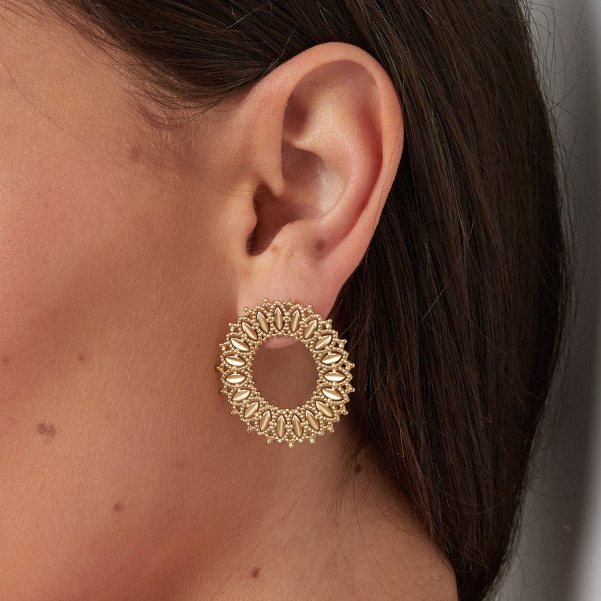 Pendientes acero sol oro