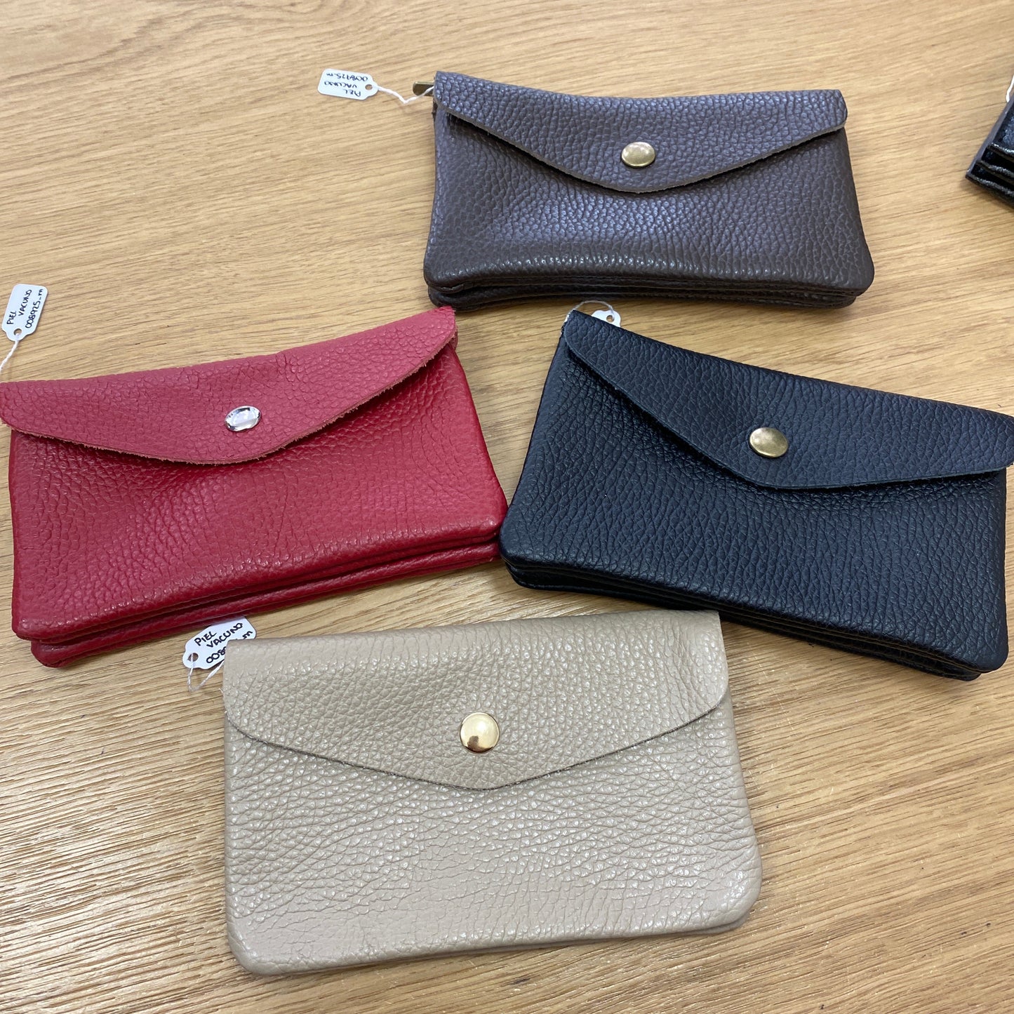 Monedero mediano 100% piel con acabado liso