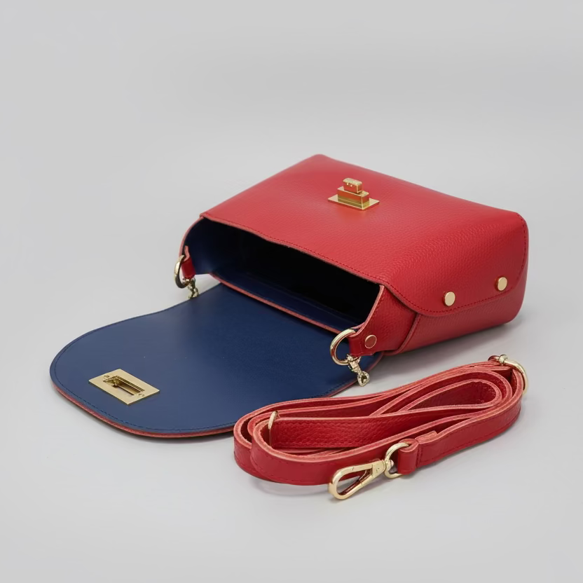 Bolso de piel 100% vacuno tipo bucket con tachuelas