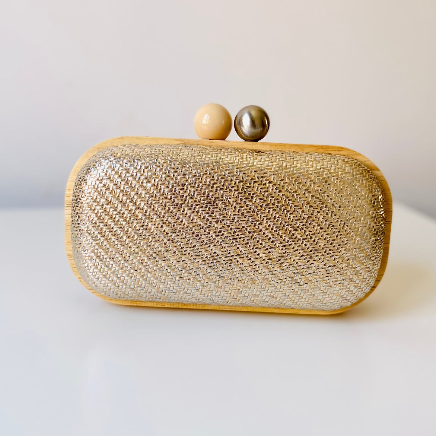 Bolso fiesta de mano de madera tipo rafia acabado plata