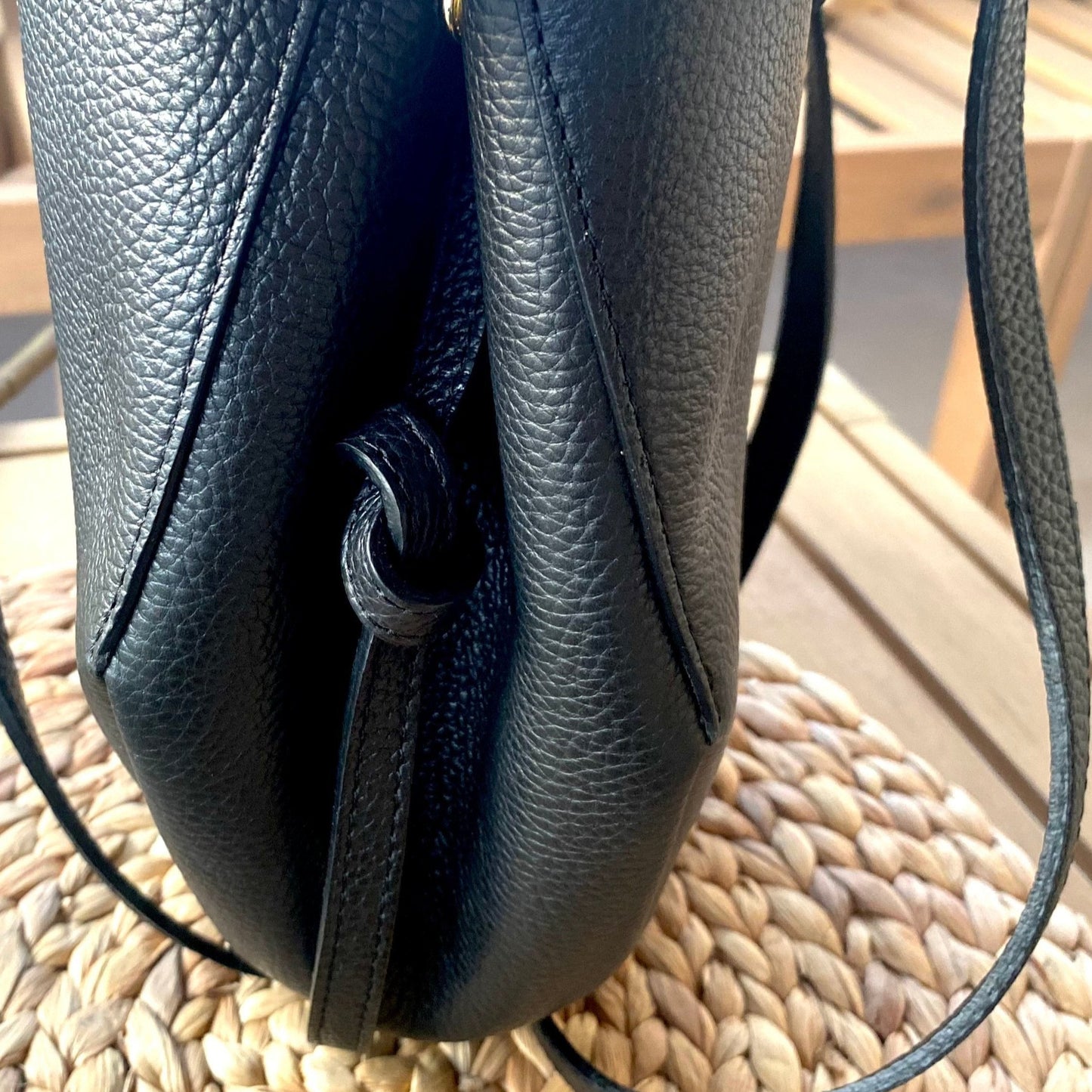 Crossbody bag with black stitching