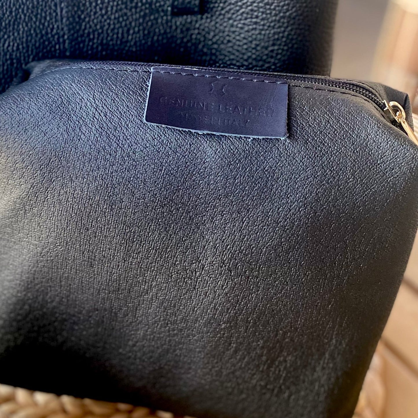 Crossbody bag with black stitching