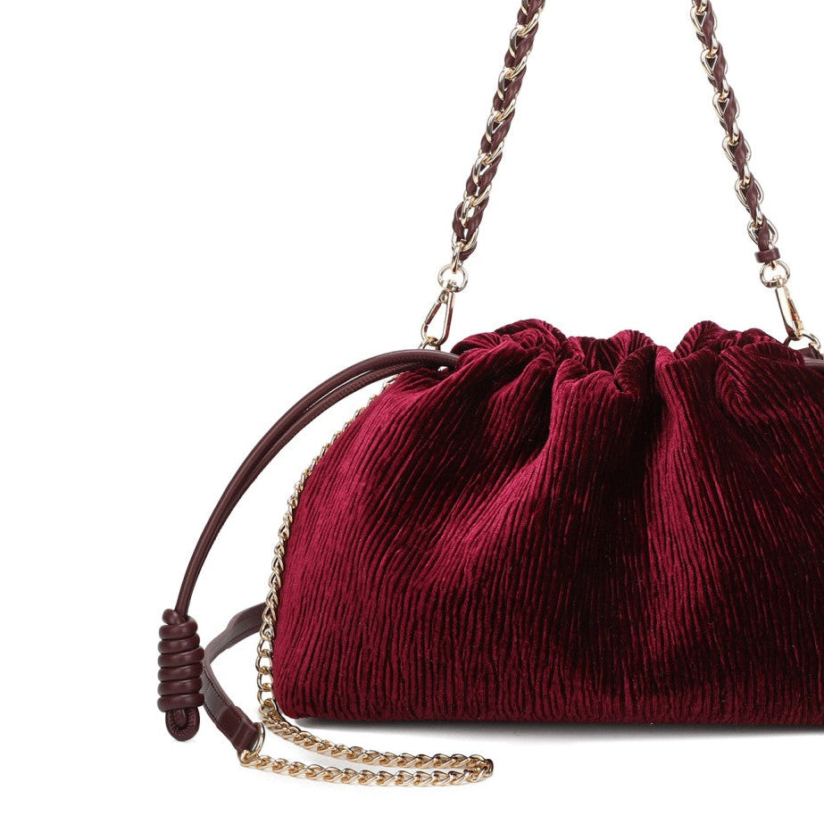 Bolso de mano y bandolera en formato saco con tejido rugoso de terciopelo en color burdeos - mbyou