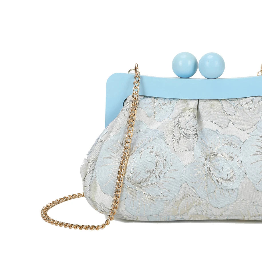 Bolso de mano de fiesta con diseño floreado en azul bebé y cierre vintage - Moments by You