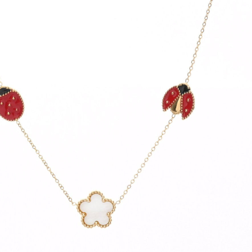 Collier acier aztèque doré et pierres bleues