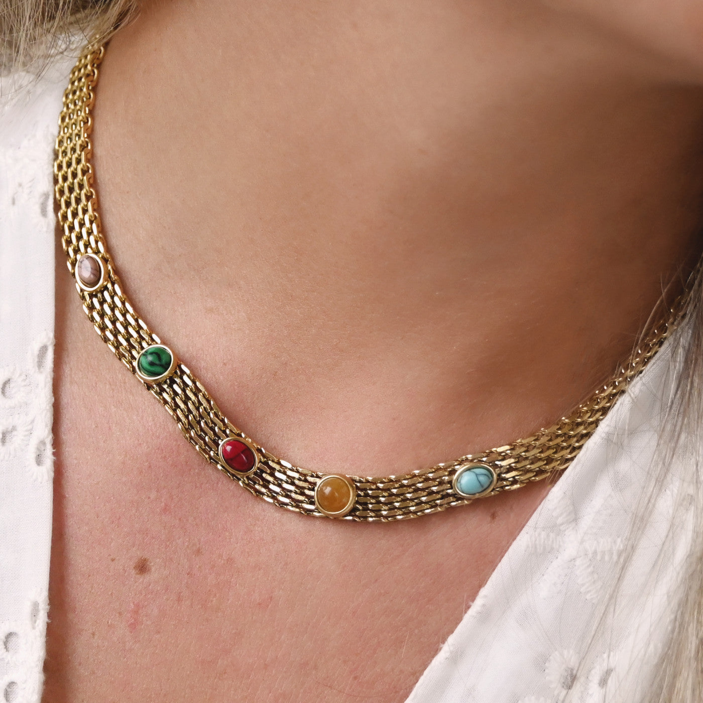 Collier acier aztèque doré et pierres bleues