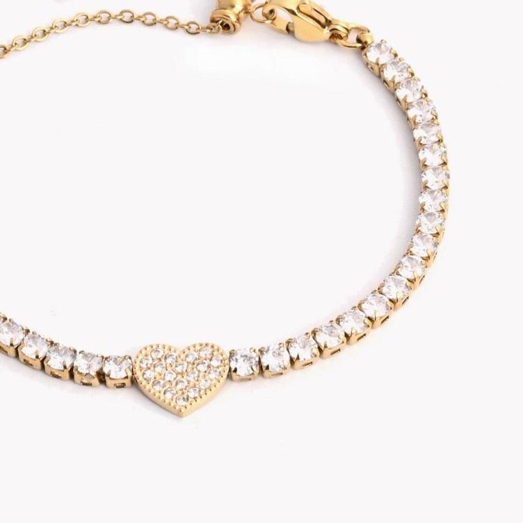Pulsera de acero riviera con corazón brillante acabado oro