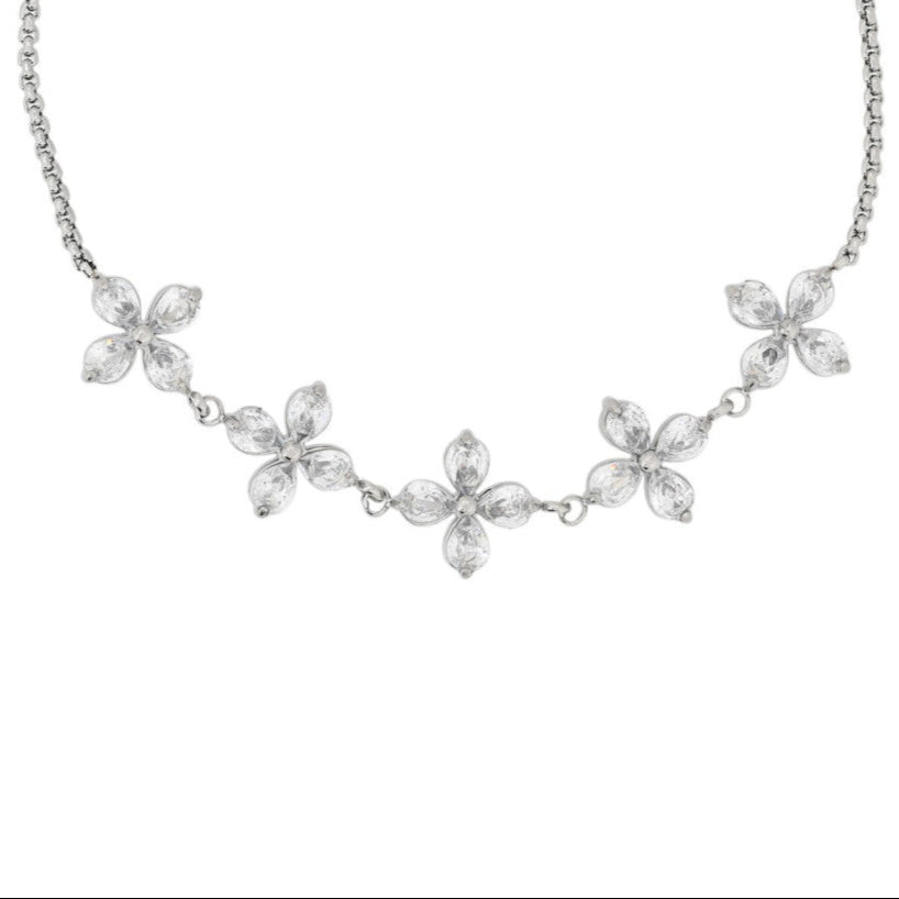 Pulsera de acero inoxidable con diseños florales de circonitas en cada pétalo acabado plata - mbyou
