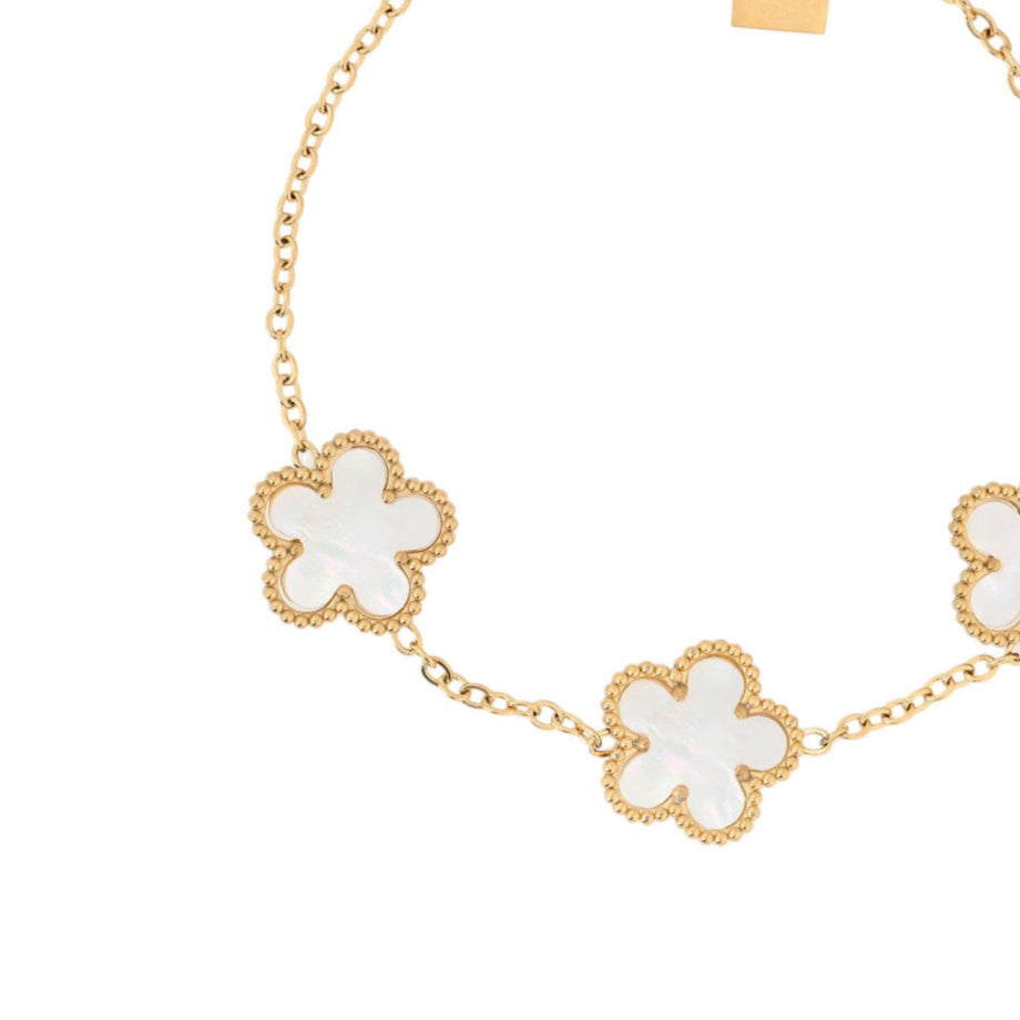 Pulsera de acero inoxidable con tréboles blancos de nácar acabado oro - mbyou