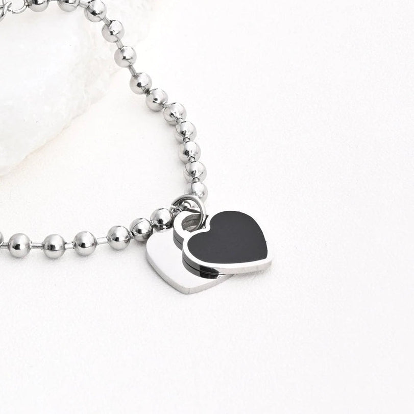 Pulsera de acero inoxidable con bolitas y corazón doble negro acabado plata - mbyou
