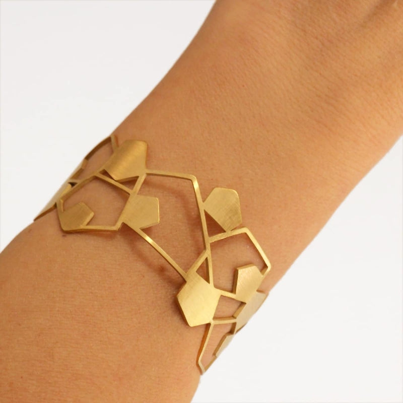 Pulsera de acero quirúrgico con formas geométricas pulido mate entera y con huecos acabado plata - mbyou