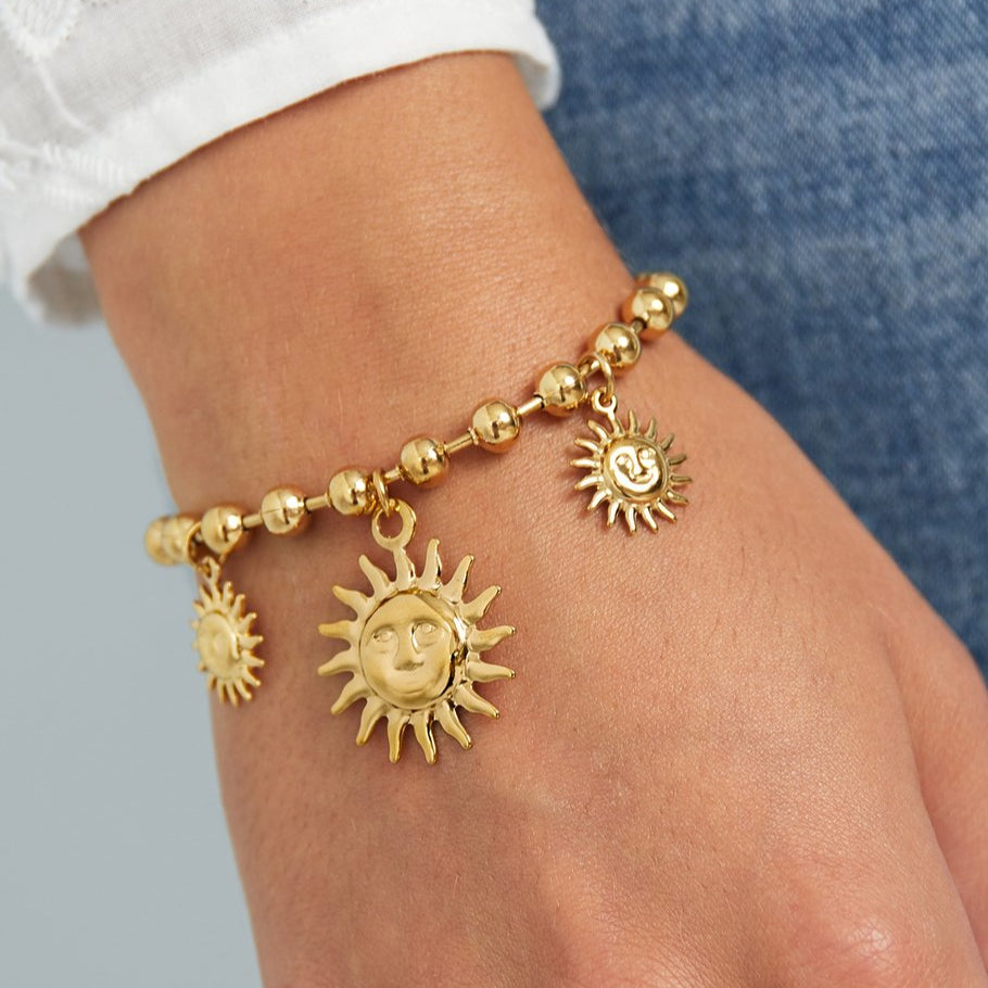 Pulsera de acero inoxidable con cuentas esféricas y tres soles colgando acabado plata - mbyou