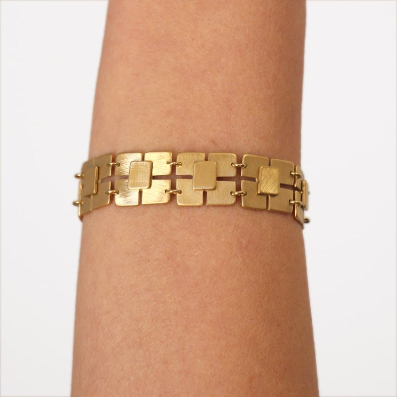 Pulsera de acero pulido mate con diseño de cuadrados acabado oro - mbyou