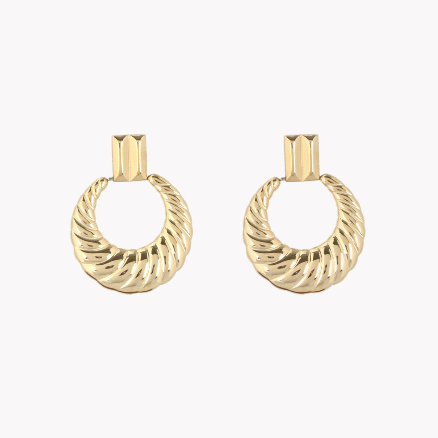 Aros de acero con textura acabado oro