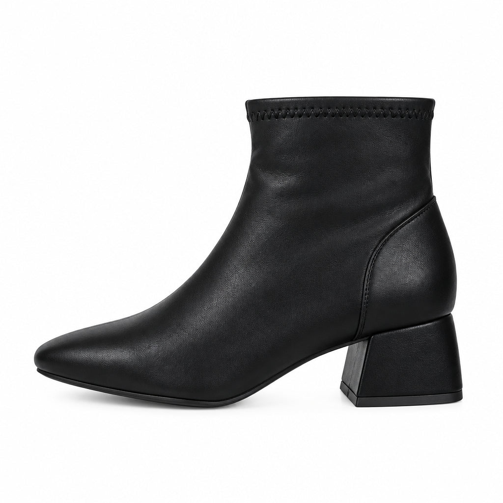 Botines de tacón acabado cuero en negro y punta redonda