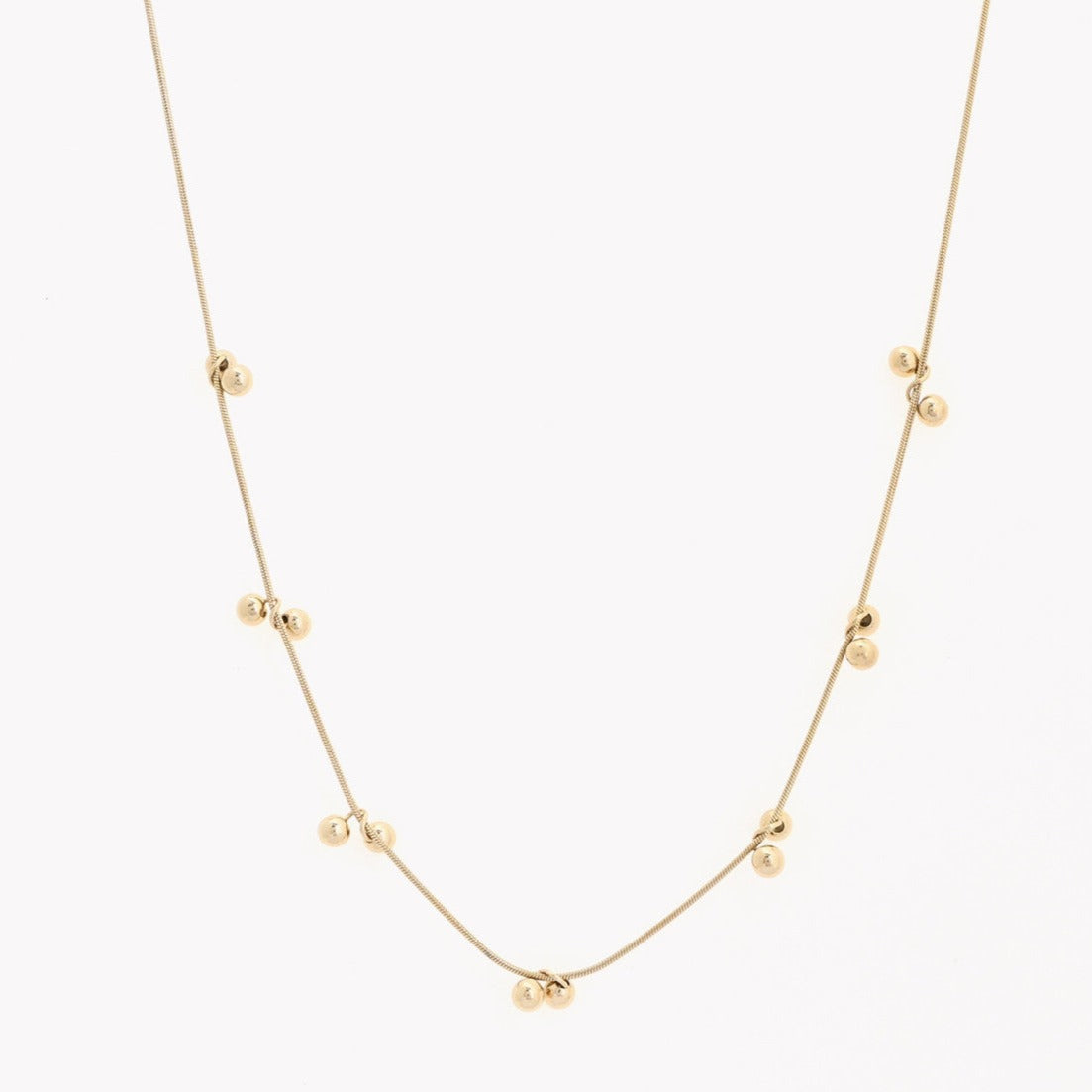 Gold polka dot steel necklace