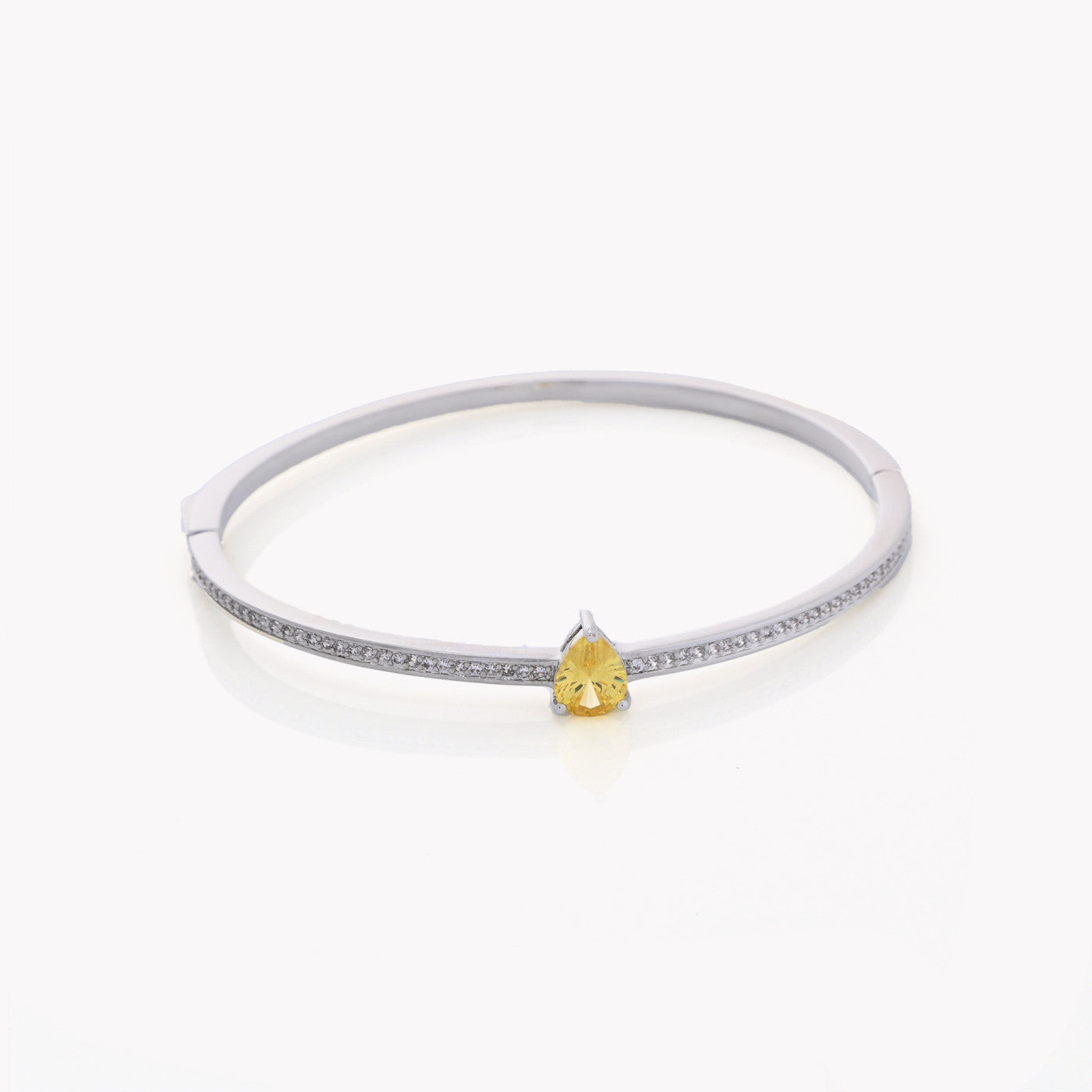 Bracelet rigide en acier avec trèfles argentés