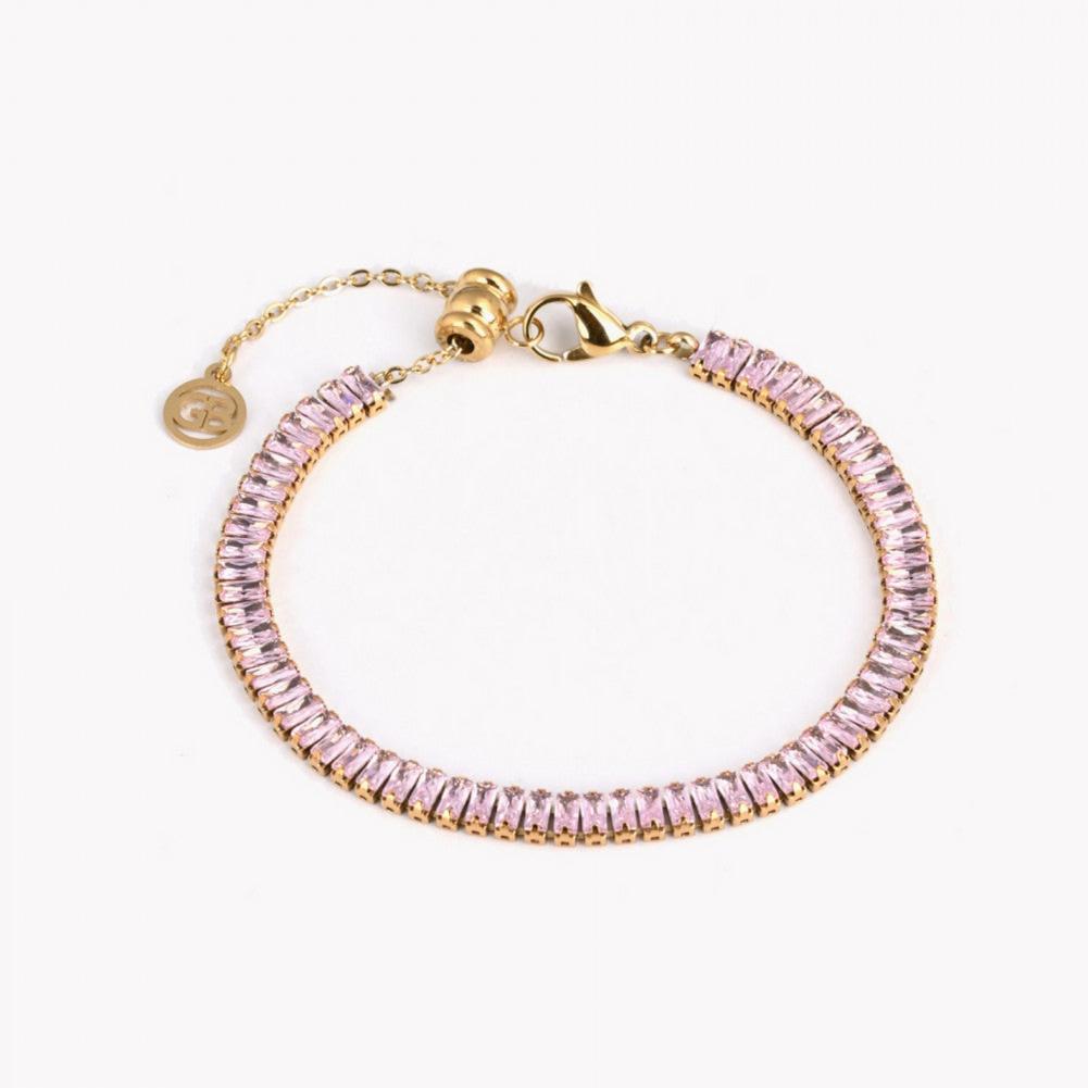 Pulsera de acero riviera cristales baguette rosa acabado oro