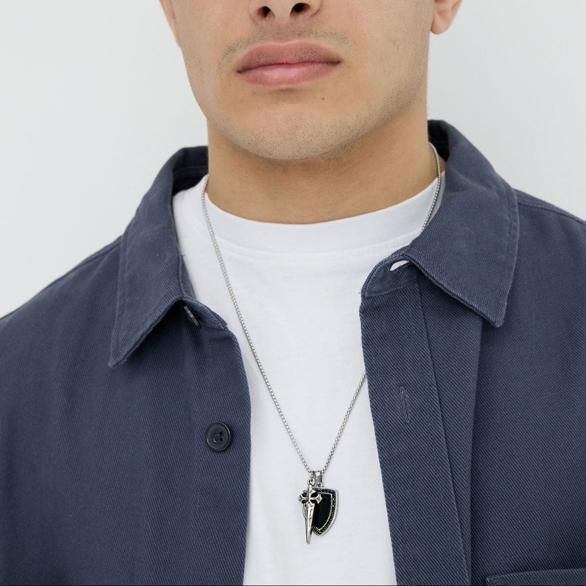 Créoles en acier avec boules dorées