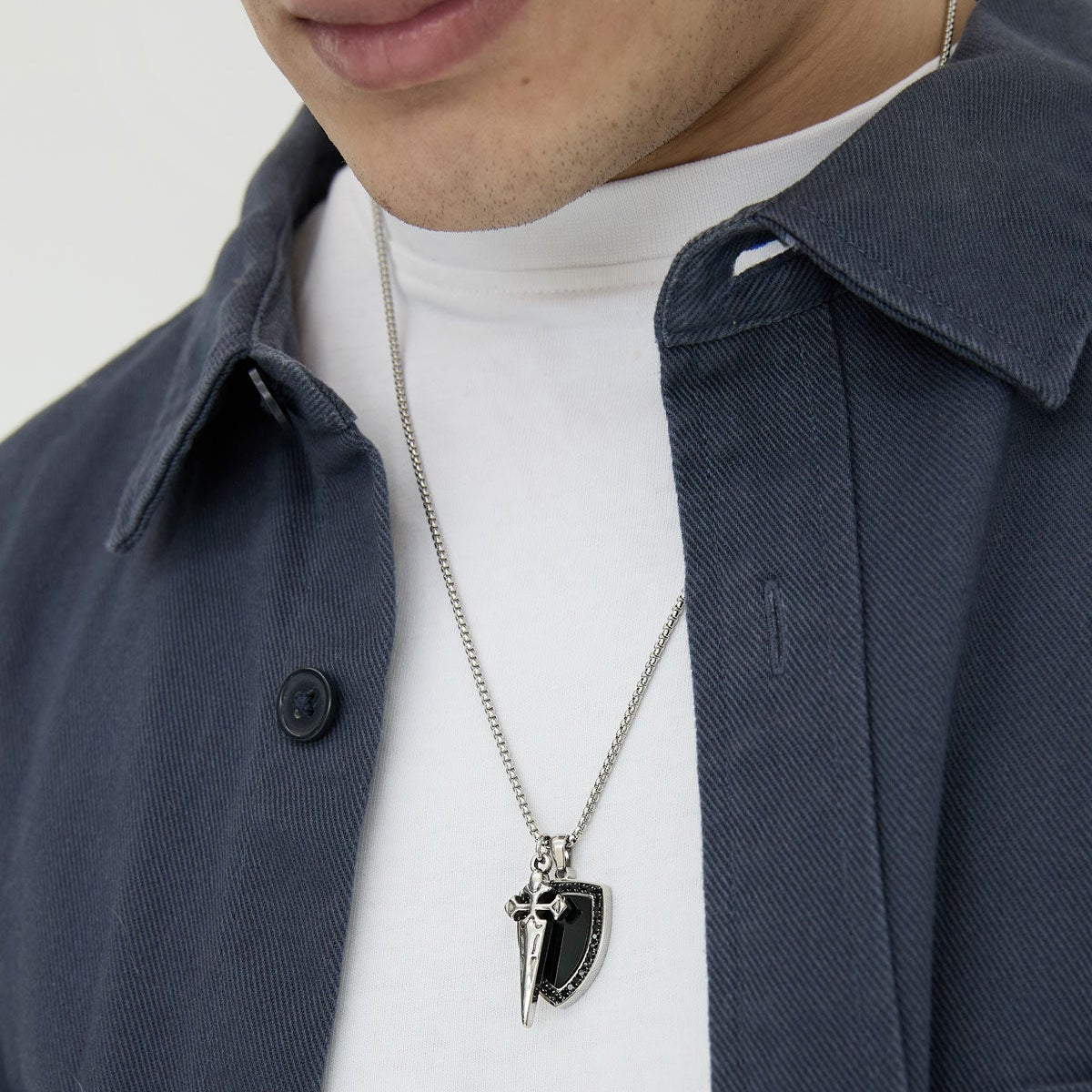 Créoles en acier avec boules dorées