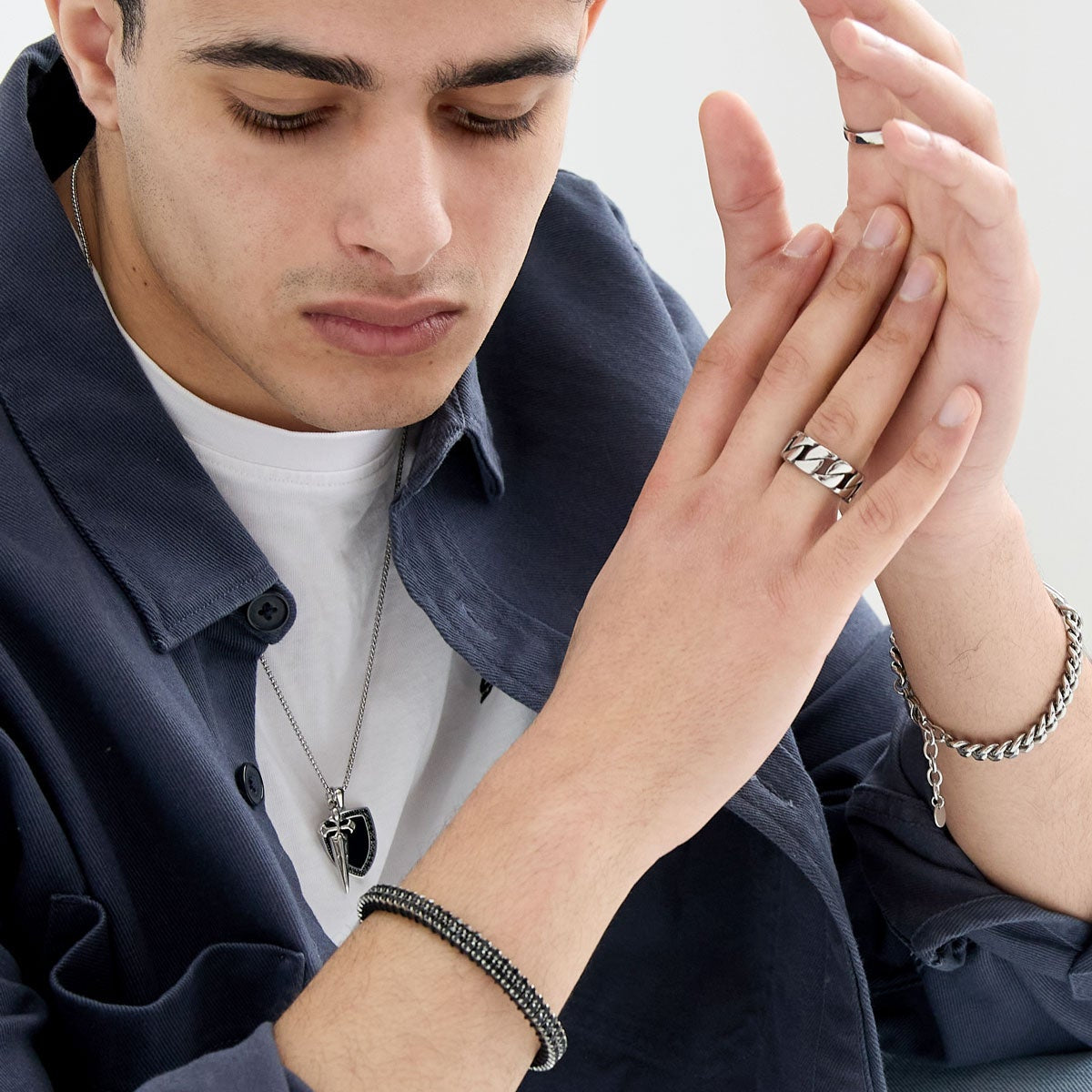 Créoles en acier avec boules dorées