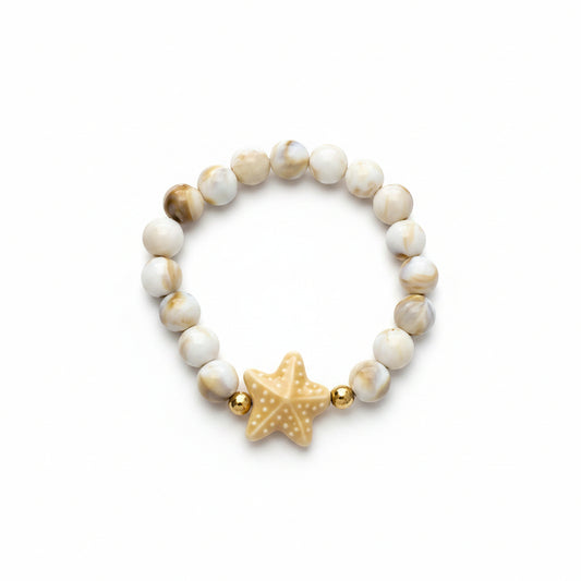 Pulsera elástica de cuentas de cerámica con efecto marmolado y estrella de mar en beige - Moments by You