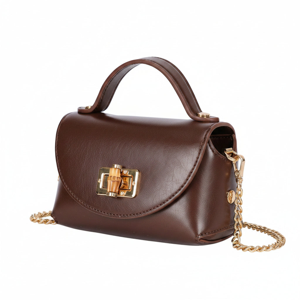 Bolso mini de mano o bandolera con solapa y cierre giratorio de bambú