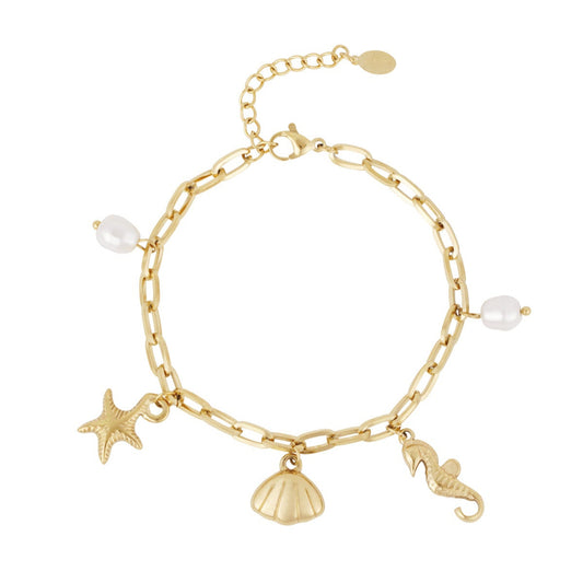 Pulsera acero de eslabones con dijes estrella marina, conchas y perlas acabado oro - mbyou