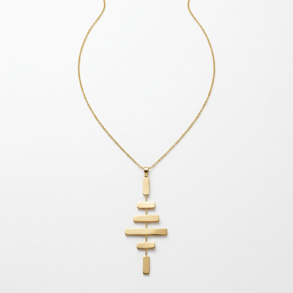 Collar de acero de placas geométricas en diferentes alturas en acabado oro