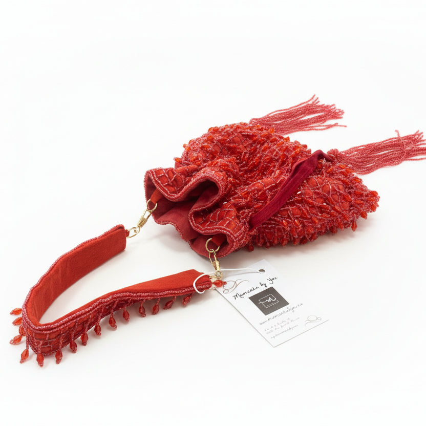 Bolso de fiesta con asa tipo limosnera rojo con flecos y borlas con tachuelas - Moments by You