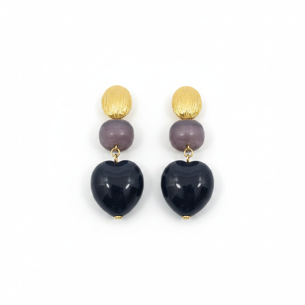 Pendientes largos de acero de diferentes formas y texturas en negro y oro