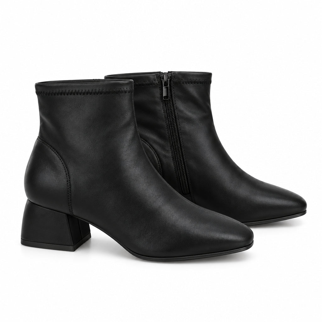 Botines de tacón acabado cuero en negro y punta redonda