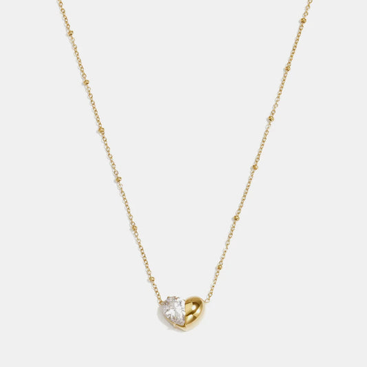 Collar de acero con esferas y dije de corazón mitad circonita en acabado oro - Moments by You