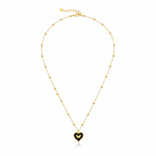 Collar de acero con dije de corazón negro con mariposa acabado oro - Moments by You