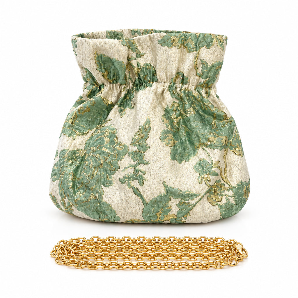 Bolso de fiesta limosnera con flores combinadas con dorado