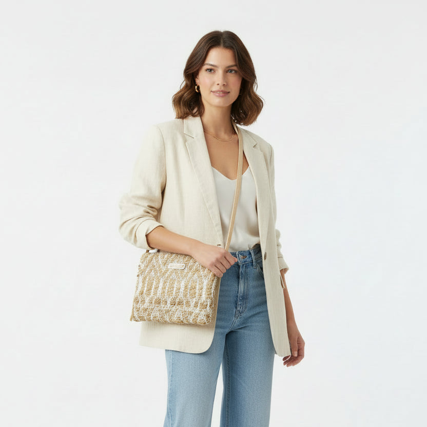 Bolso de mano tipo clutch o cartera de yute con un diseño geométrico - Moments by You