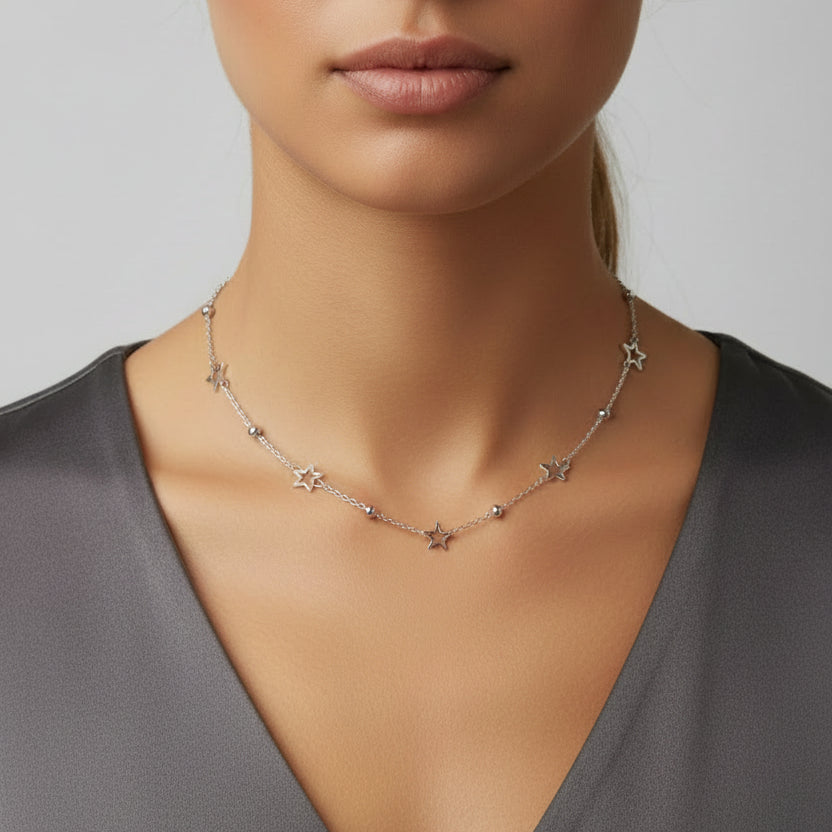 Collar de acero con esferas y estrellas
