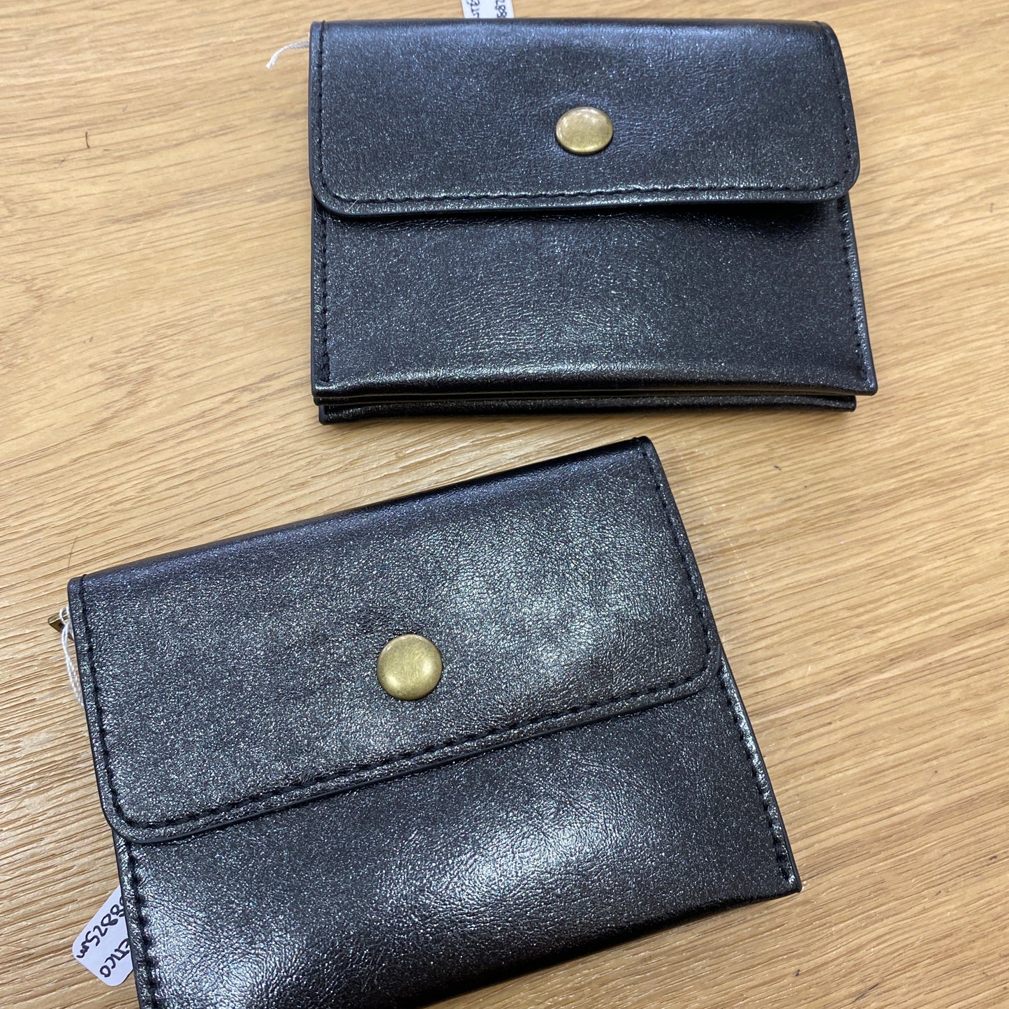 Monedero pequeño liso acabado purpurina