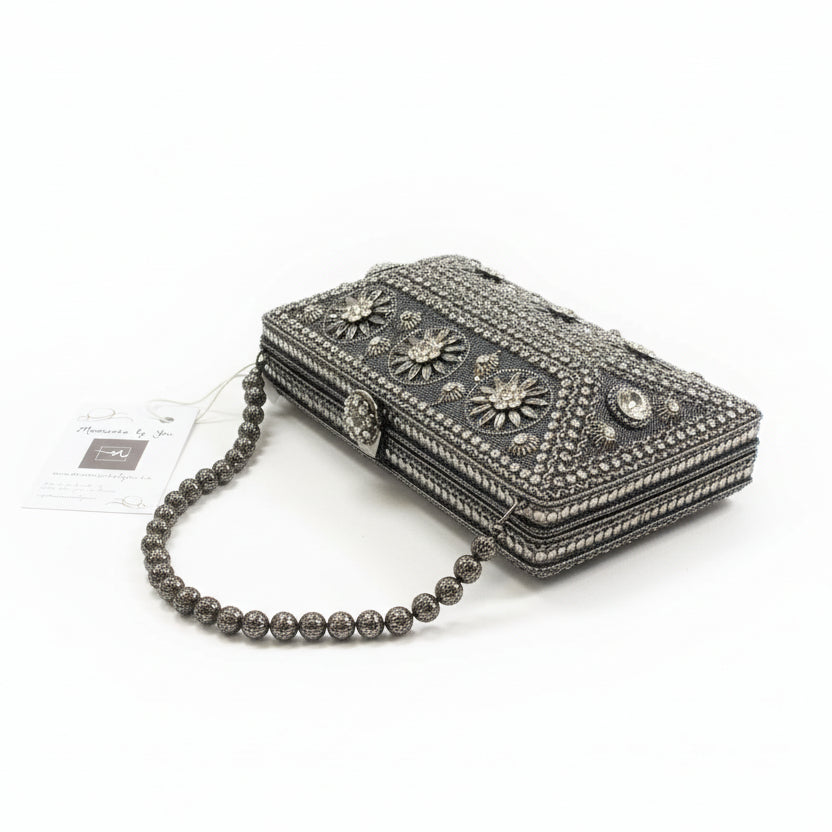 Bolso clutch de fiesta tipo joya con diseño floral de circonitas grisáceo - Moments by You