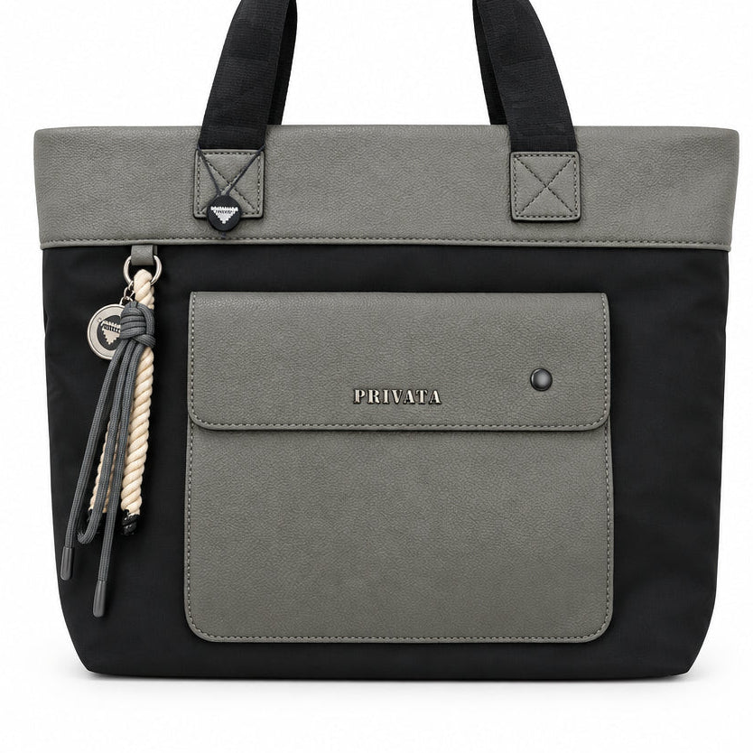 Bolso shopper negro y gris con bolsillo delantero y llavero colgante