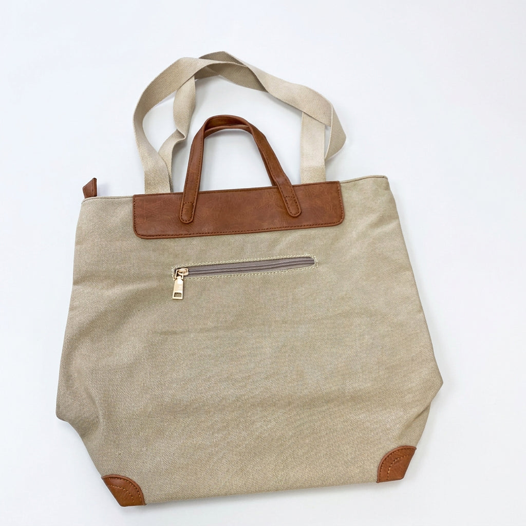 Bolso tipo tote bag de loneta con doble asa en beige y marrón