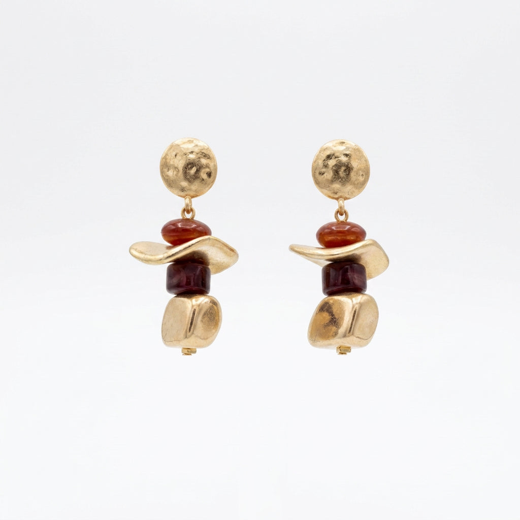 Pendientes largos con piezas irregulares en acabado oro