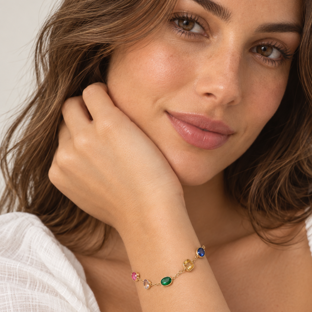 Pulsera de acero con cristales de varios colores y acabado oro