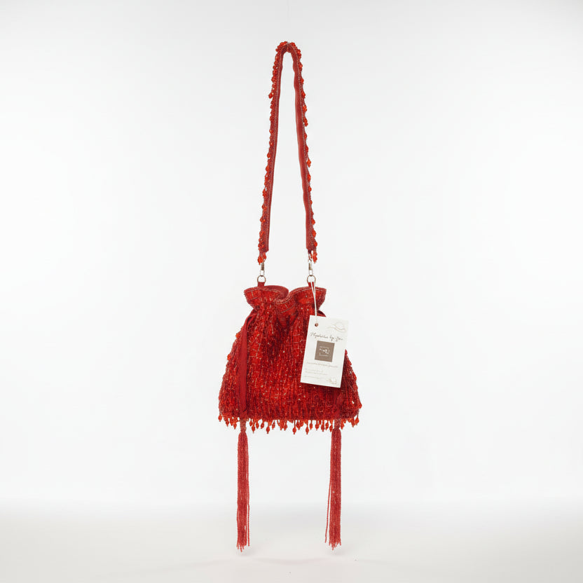 Bolso de fiesta con asa tipo limosnera rojo con flecos y borlas con tachuelas - Moments by You