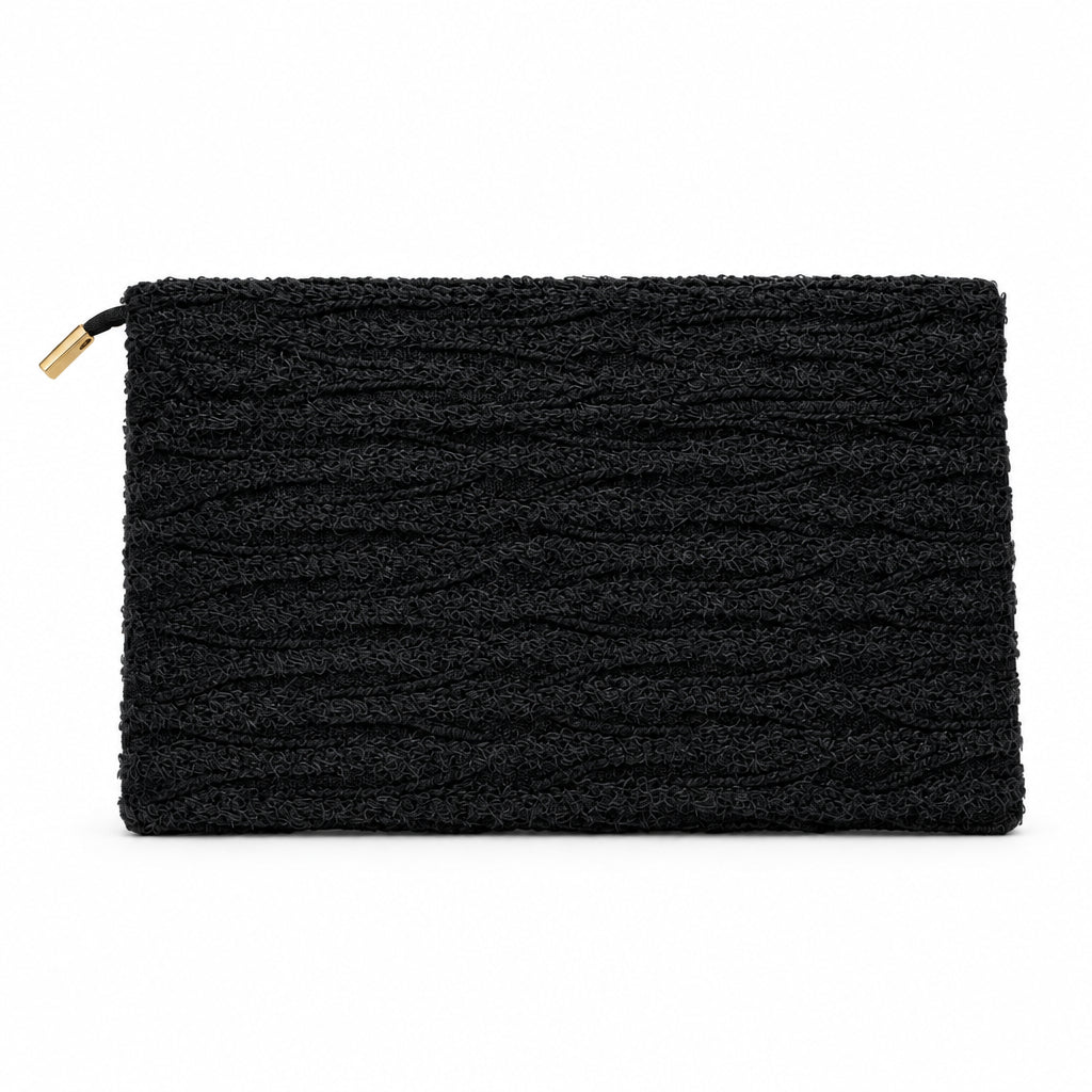 Bolso fiesta tipo sobre desflecado con solapa y borla