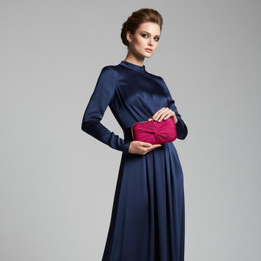 Bolso de mano de fiesta rectangular efecto ante con nudo en color buganvilla y dorado - Moments by You