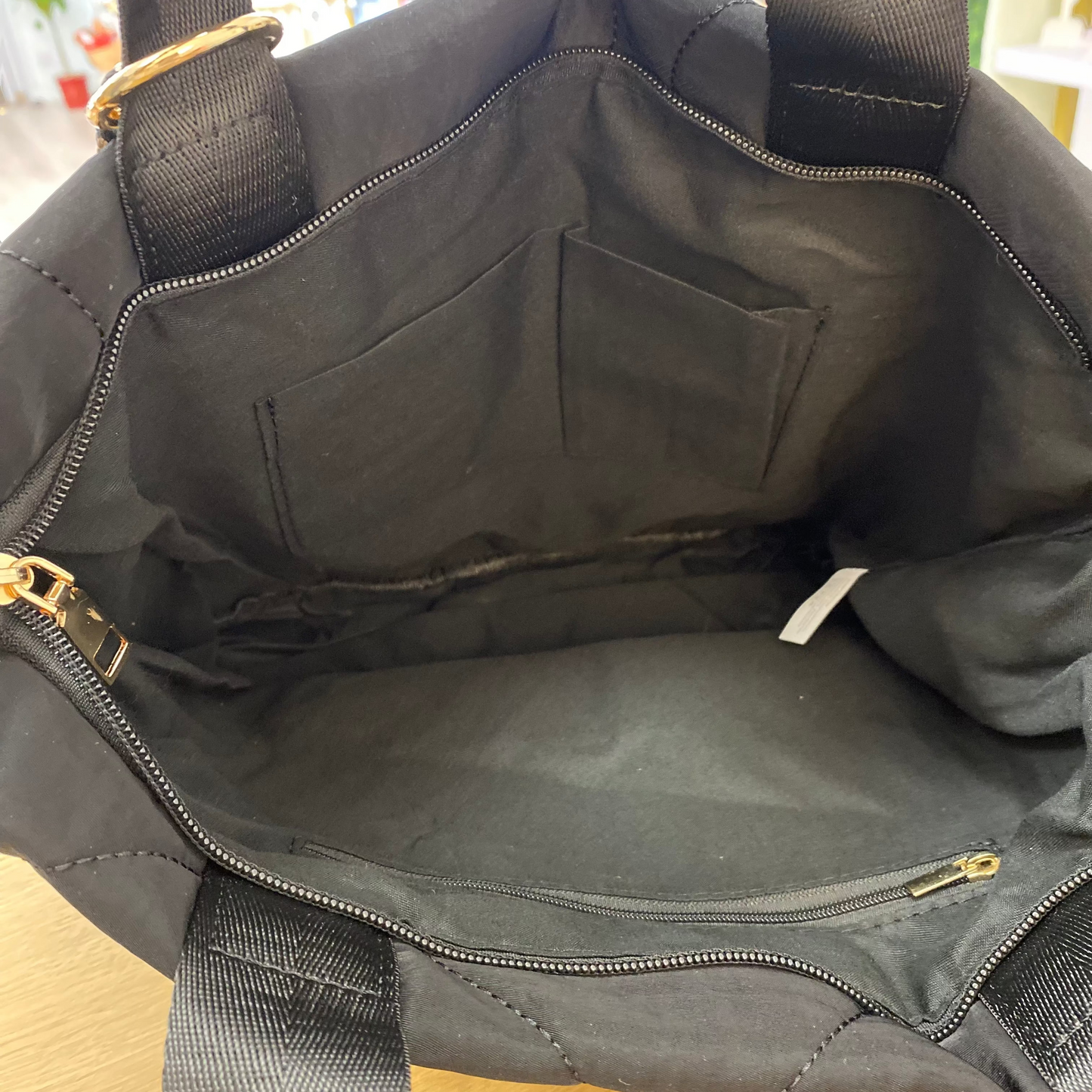 Sac bandoulière matelassé à rayures noires