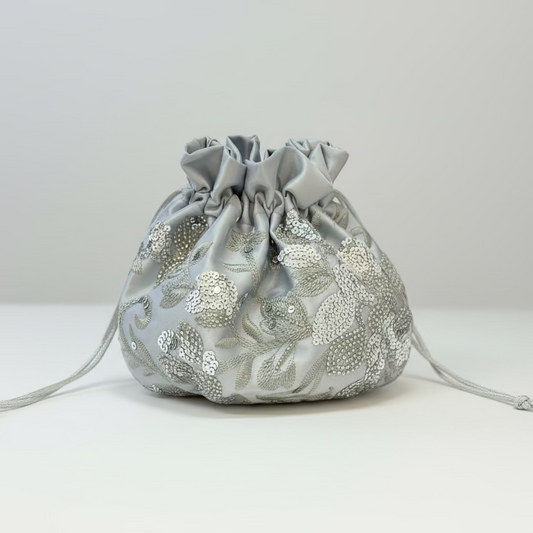 Bolso de fiesta limosnera plateada floral con lentejuelas - Moments by You